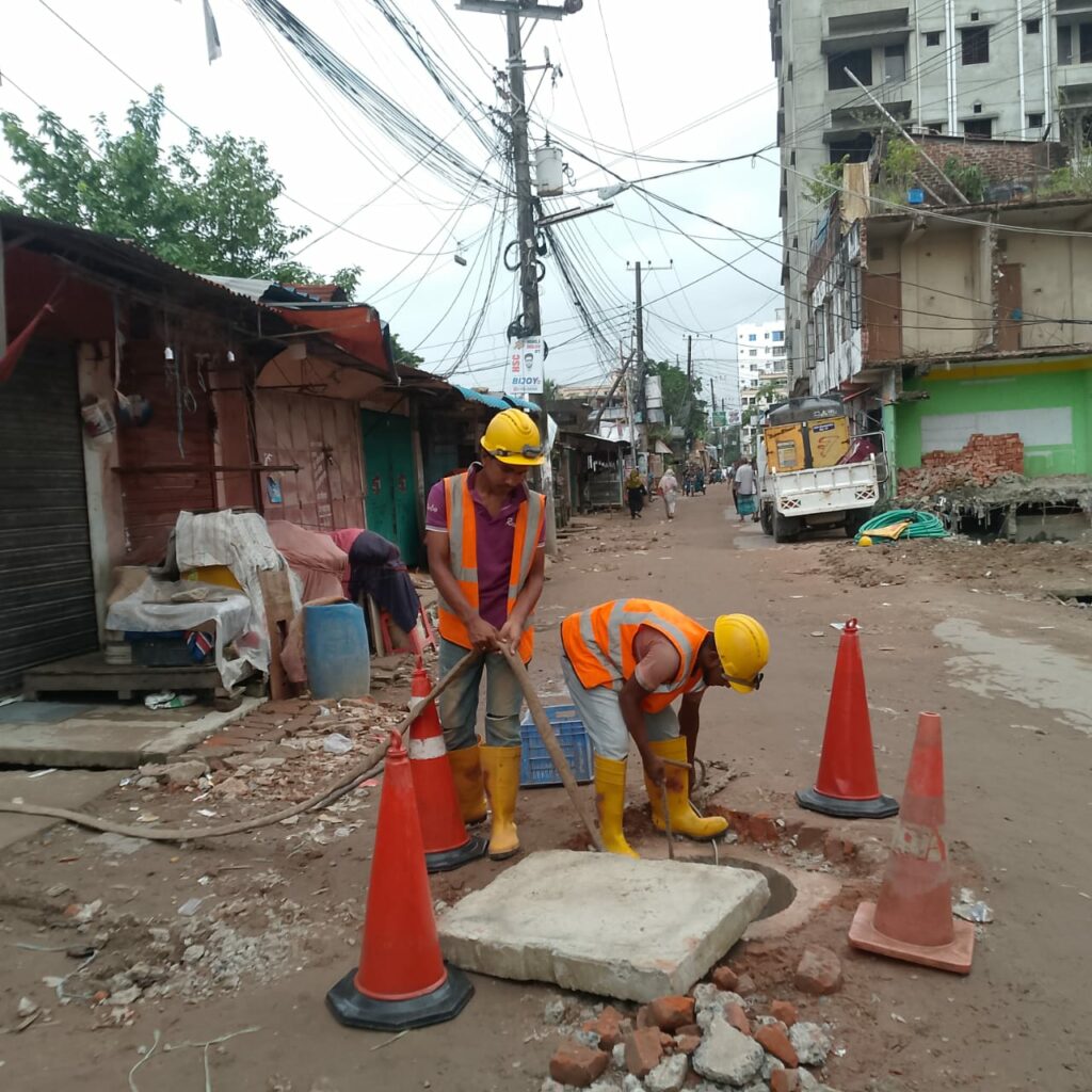 pipe cleaning work going on for cc tv check, chittagong