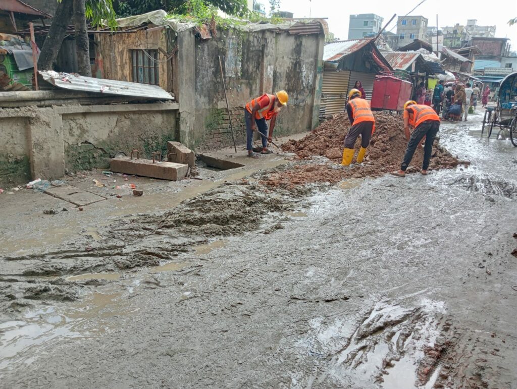 road repairing work on going at d zone hazi badsha mia brick field road, chittagong