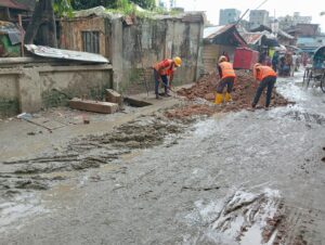 road repairing work on going at d zone hazi badsha mia brick field road, chittagong
